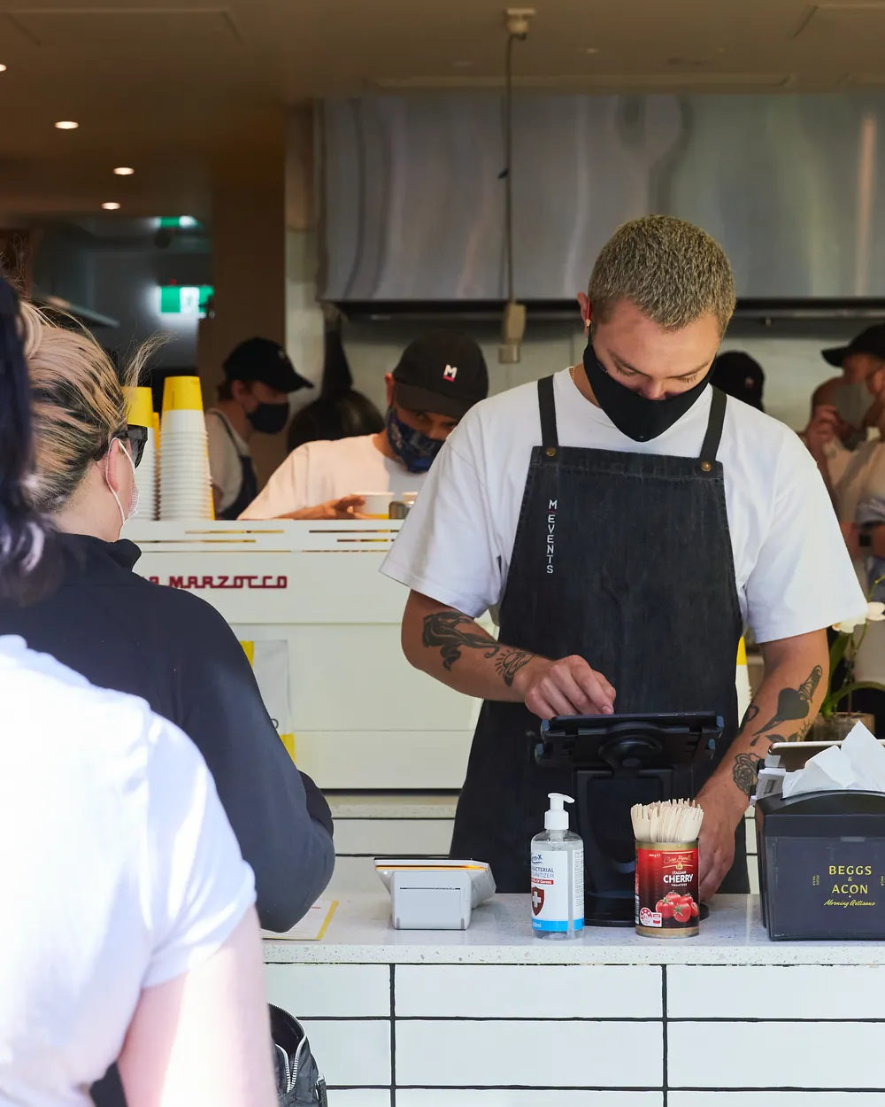 A Beggs chef plating up behind the counter